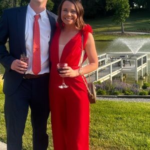Red tool jumpsuit! Worn once - from a boutique. Very flattering